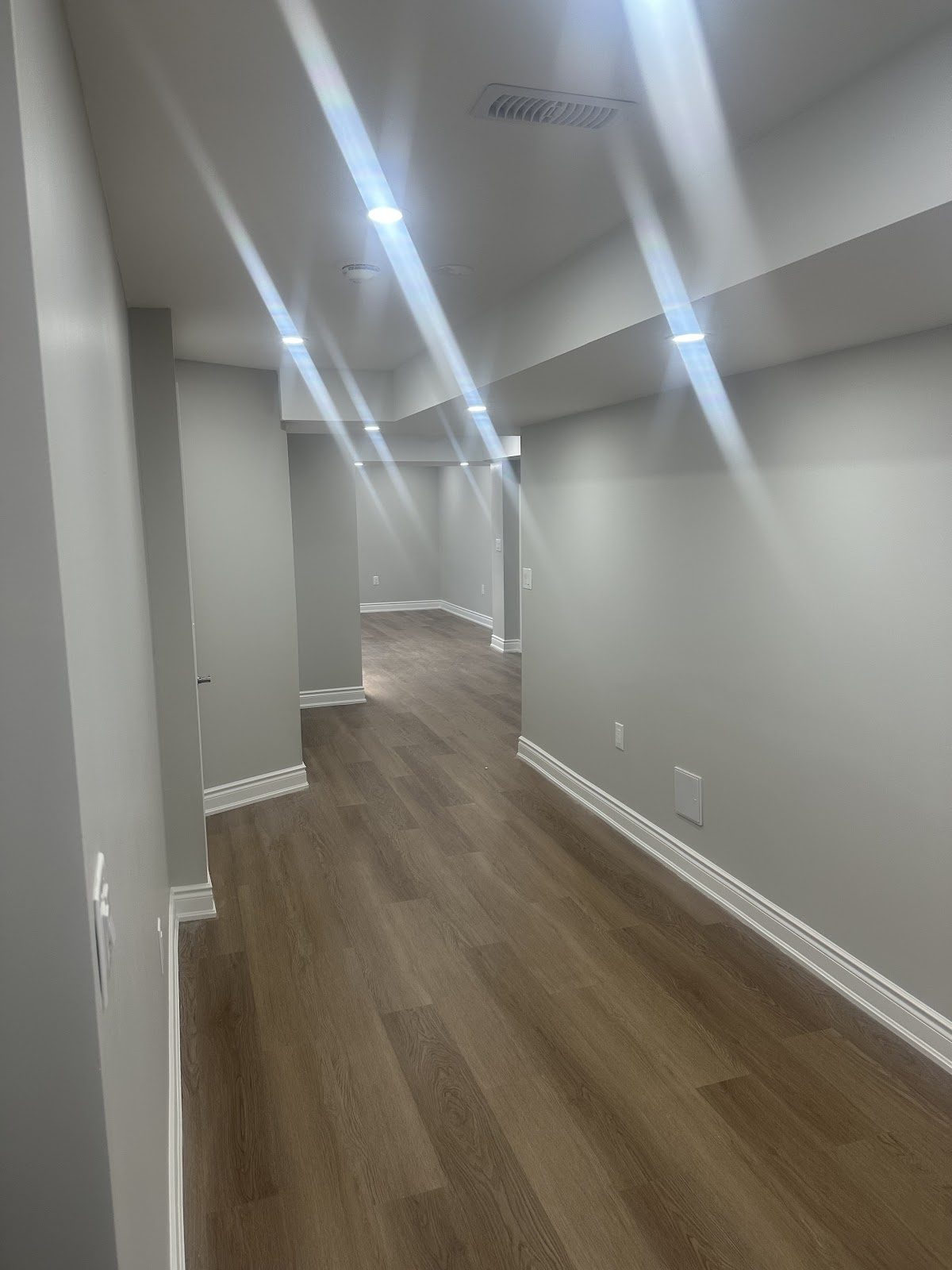 Real completed basement finishing hallway